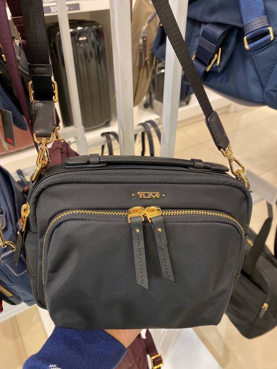 claudia crossbody tumi